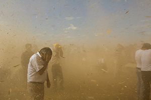 A dust devil passes near Dikmetas, Turkey, in September 2014 as thousands of refugees flee